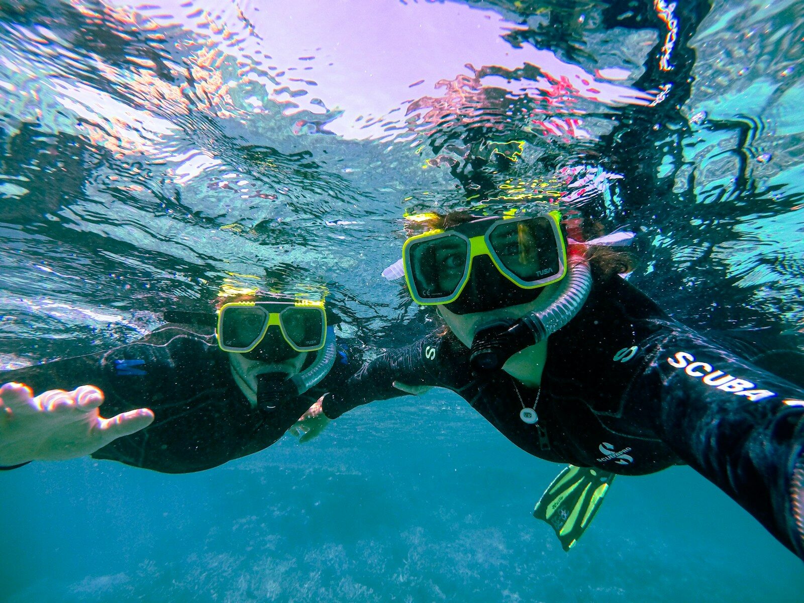 a person in scuba gear under water